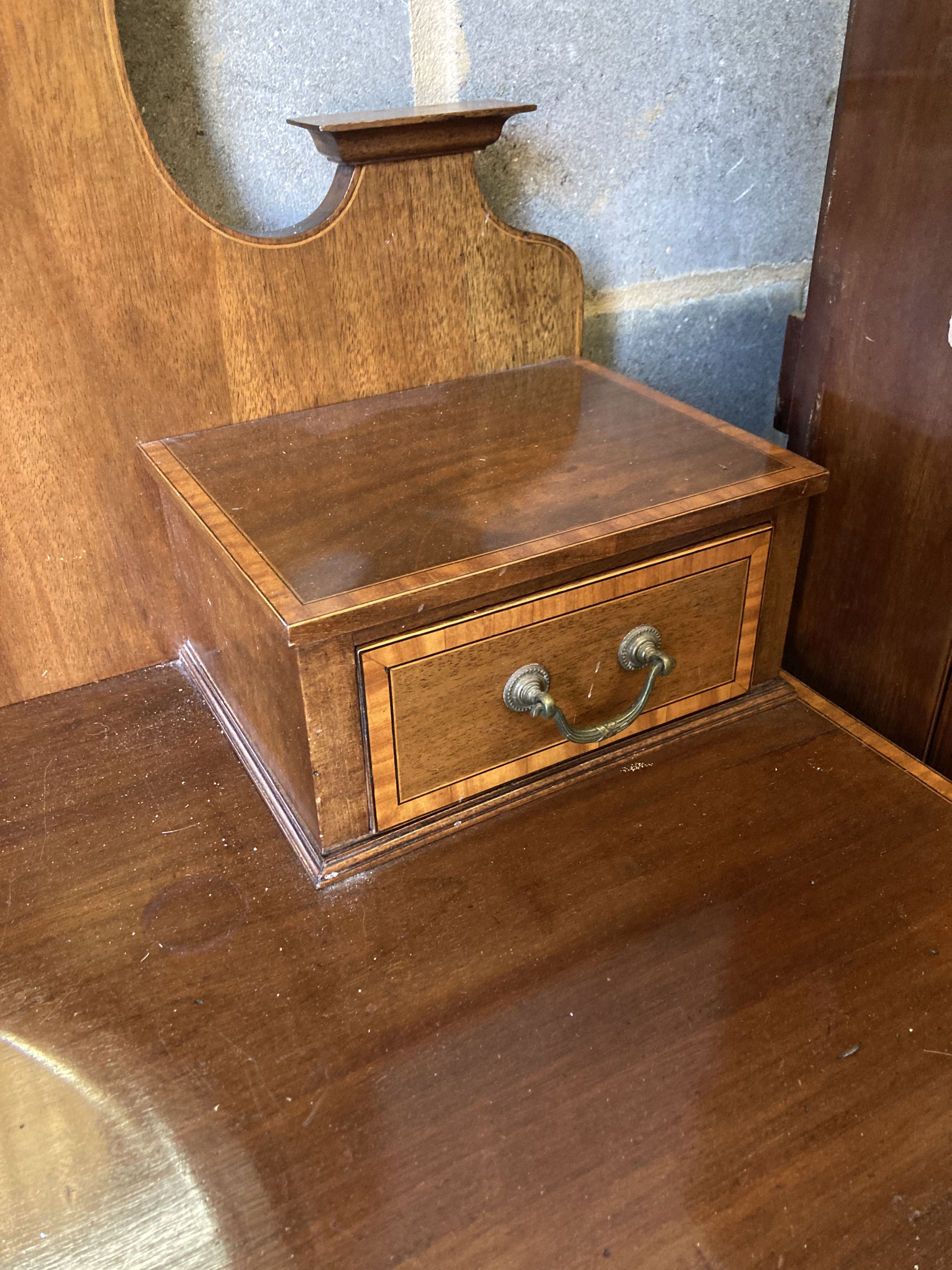 An Edwardian satinwood banded mahogany dressing table, width 107cm, depth 52cm, height 190cm